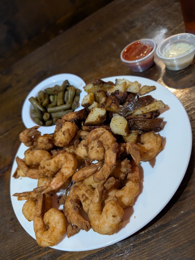 Fried shrimp plate with home fries and green beans at Easterby's Family Grille